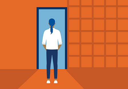 A person walking into a blue door