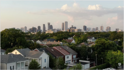 Houses in the foreground with city in the background