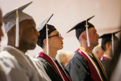 Men in graduation caps and gowns